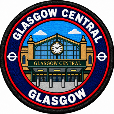 Round 80mm embroidered patch showing a stylised Glasgow Central station entrance with green framing and a central clock, finished with a black border.