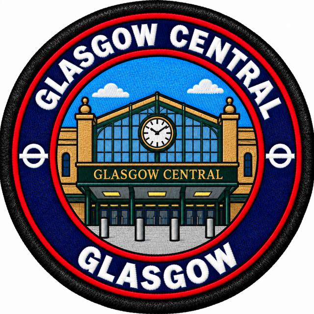 Round 80mm embroidered patch showing a stylised Glasgow Central station entrance with green framing and a central clock, finished with a black border.
