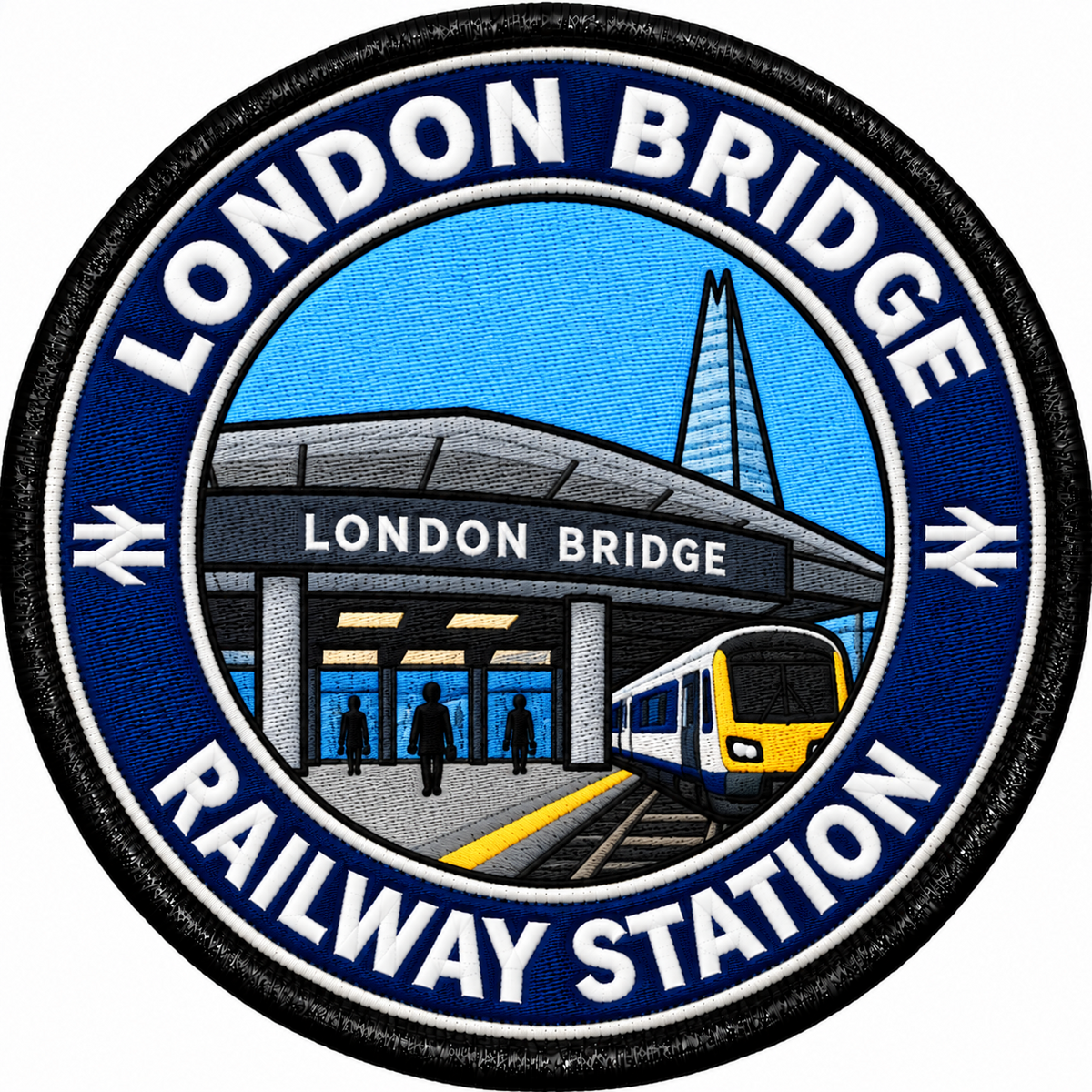 Round 80mm embroidered patch showing the London Bridge station entrance, a passenger train and the Shard, with white LONDON BRIDGE RAILWAY STATION lettering on a navy ring, finished with a black border.