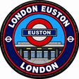 Round 80mm embroidered patch showing a red Euston roundel above a stylised station entrance, with LONDON EUSTON lettering, finished with a black border.