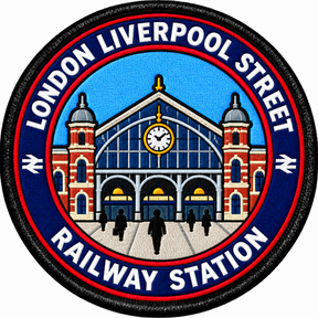 Round 80mm embroidered patch showing a stylised Liverpool Street station facade with red brick towers, a central clock and LONDON LIVERPOOL STREET RAILWAY STATION lettering, finished with a black border.