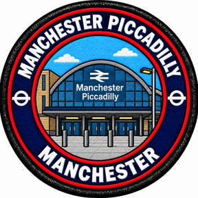 Round 80mm embroidered patch showing a stylised arched Manchester Piccadilly station entrance, with white lettering on a navy ring and red trim, finished with a black border.