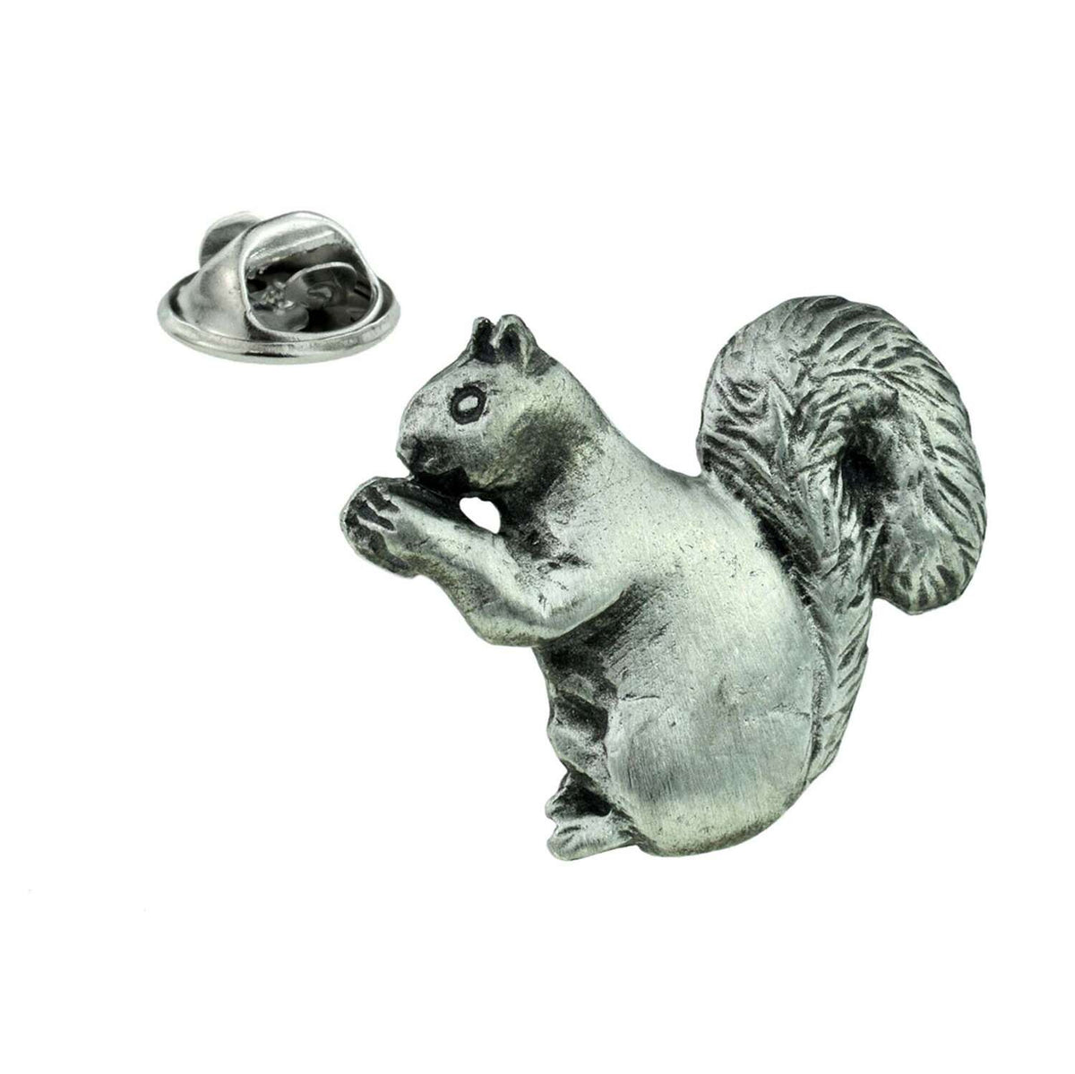 Pewter squirrel lapel pin badge holding a nut with textured bushy tail and butterfly clasp