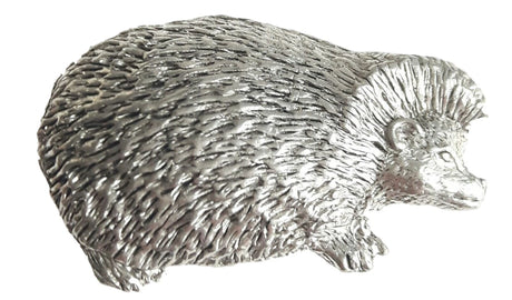 Detailed pewter hedgehog pin badge with butterfly clutch fastening on a white background.