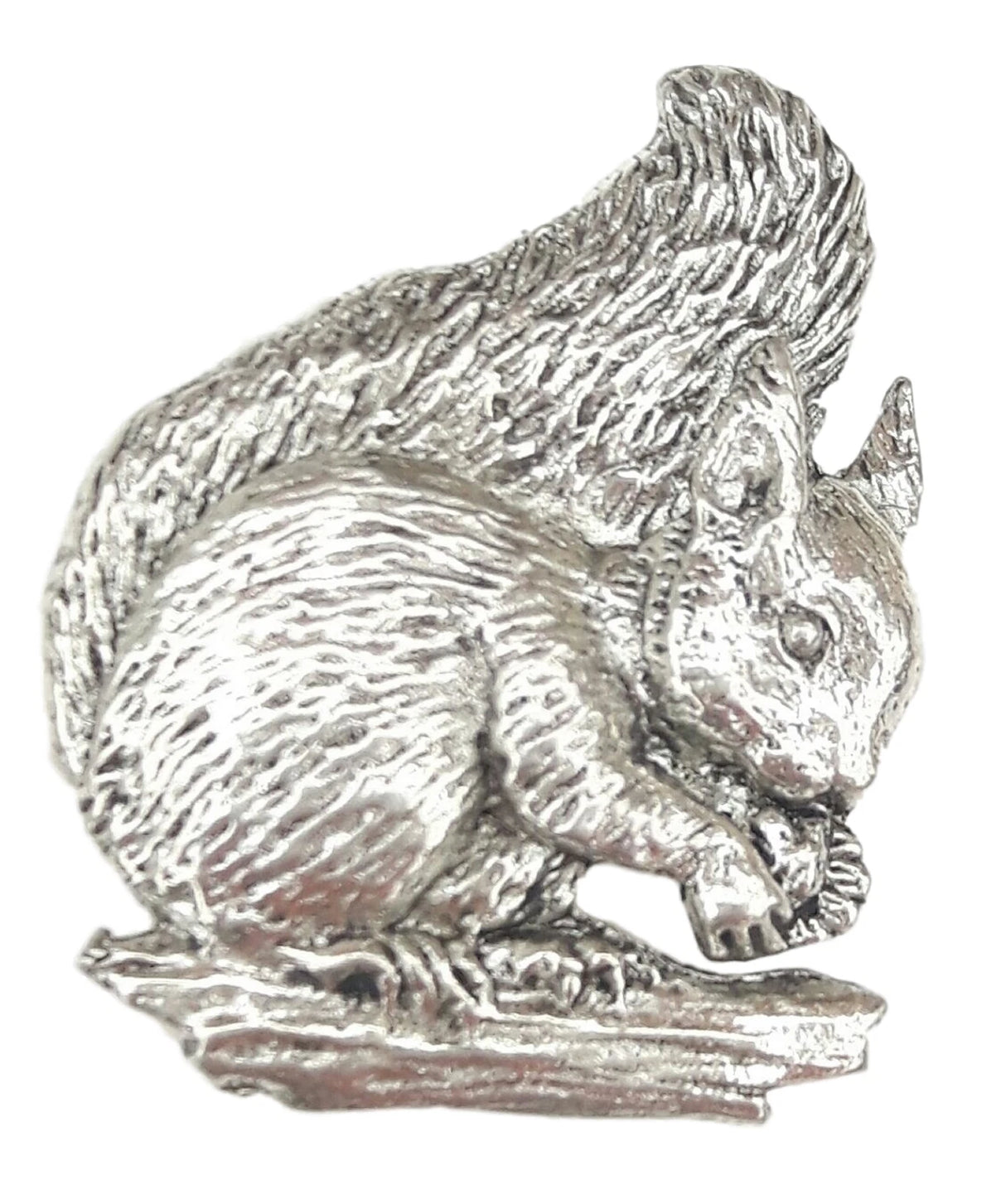 Detailed pewter squirrel pin badge holding an acorn with butterfly clutch fastening on a white background.