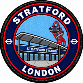 Round 80mm embroidered patch showing Stratford station with a red looping tower behind it, framed by STRATFORD and LONDON lettering, finished with a black border.