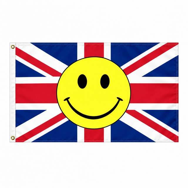 Red white and blue Union Jack flag with a large yellow smiley face in the centre
