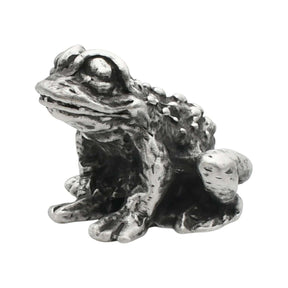 English-made pewter toad figurine ornament, front three-quarter view with large eyes and textured skin