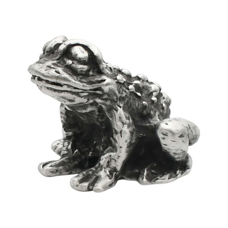 English-made pewter toad figurine ornament, front three-quarter view with large eyes and textured skin