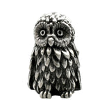 English-made pewter owl ornament, front view with wide round eyes and pronounced layered chest feathers