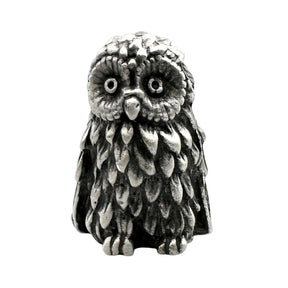 English-made pewter owl ornament, front view with wide round eyes and pronounced layered chest feathers