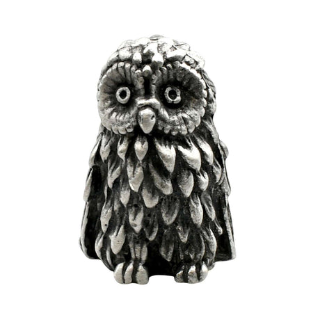 English-made pewter owl ornament, front view with wide round eyes and pronounced layered chest feathers