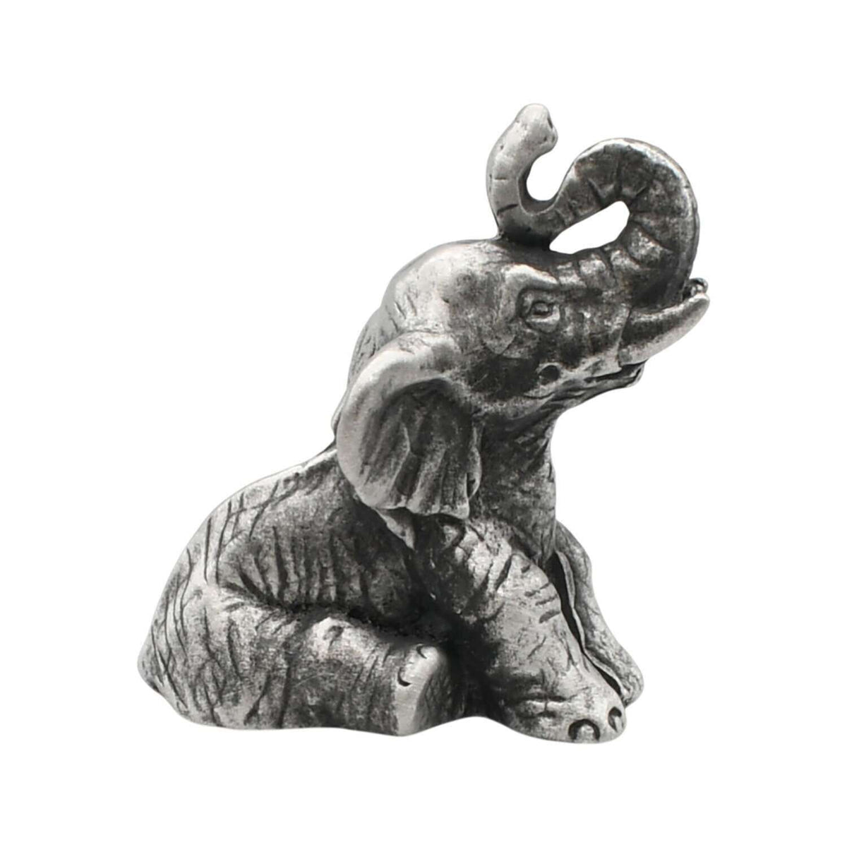 English-made pewter sitting elephant figurine ornament with trunk raised and curled, first three-quarter view
