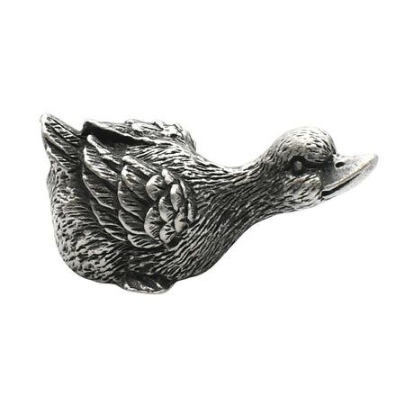 English-made pewter duck stretching ornament, first side view showing extended neck and detailed wings