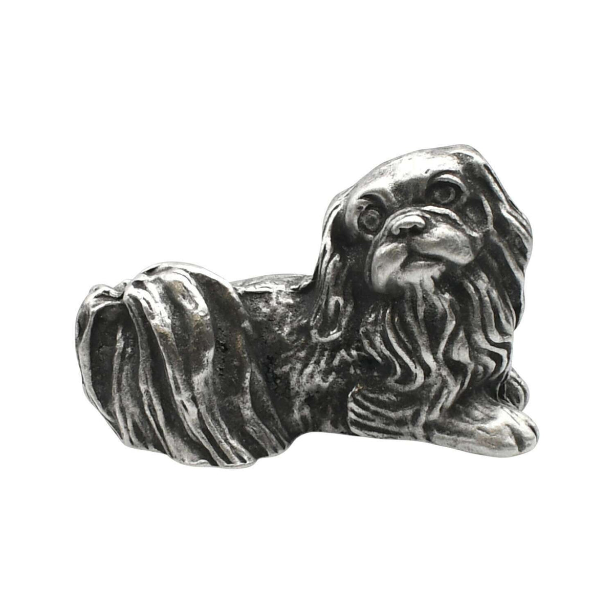 English-made pewter Pekingese dog figurine ornament lying down, with long flowing fur and a curled tail