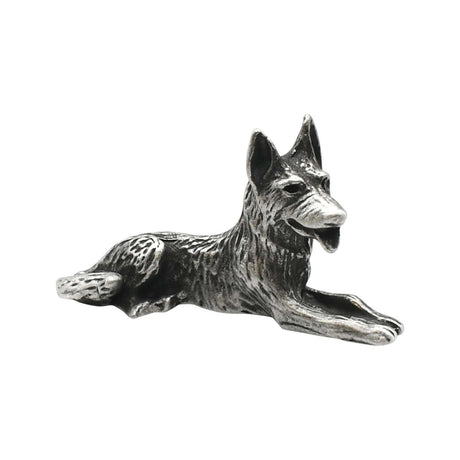 English-made pewter Alsatian German Shepherd dog ornament, lying down with upright ears and front legs extended