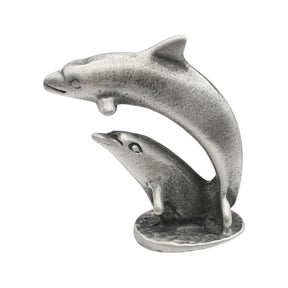English-made pewter double dolphin ornament, first side view showing two leaping dolphins on a shared base