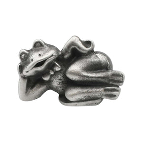 English-made pewter comic frog figurine, reclining with head resting on one hand and legs stretched out – front view