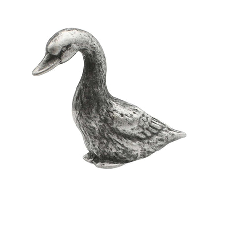 English-made pewter goose figurine ornament in side profile with long curved neck, lowered beak and detailed wing feathers