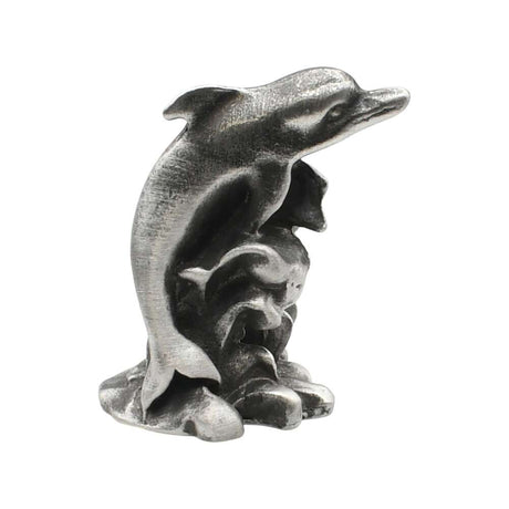 English-made pewter Dolphin Splash ornament, opposite side view showing leaping dolphin and curled water detail