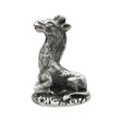 English-made pewter giraffe ornament, seated with long neck, raised head and sculpted coat patches – front view