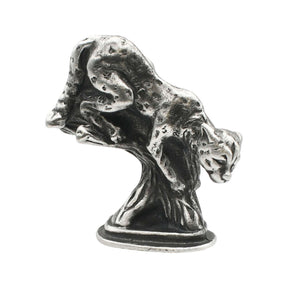 English-made pewter leopard figurine ornament climbing down a tree branch, first side view showing spotted coat