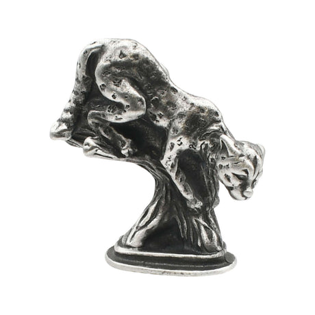 English-made pewter leopard figurine ornament climbing down a tree branch, first side view showing spotted coat