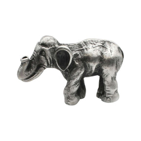 English-made pewter Asian elephant figurine ornament, first side view showing curved trunk, ears and sculpted body details