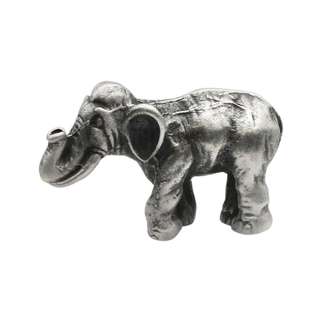 English-made pewter Asian elephant figurine ornament, first side view showing curved trunk, ears and sculpted body details