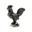 English-made pewter cockerel rooster figurine ornament, first side view showing comb, wing detail and raised tail feathers