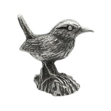 English-made pewter wren ornament perched on tree stump, first side showing raised tail and detailed wing feathers
