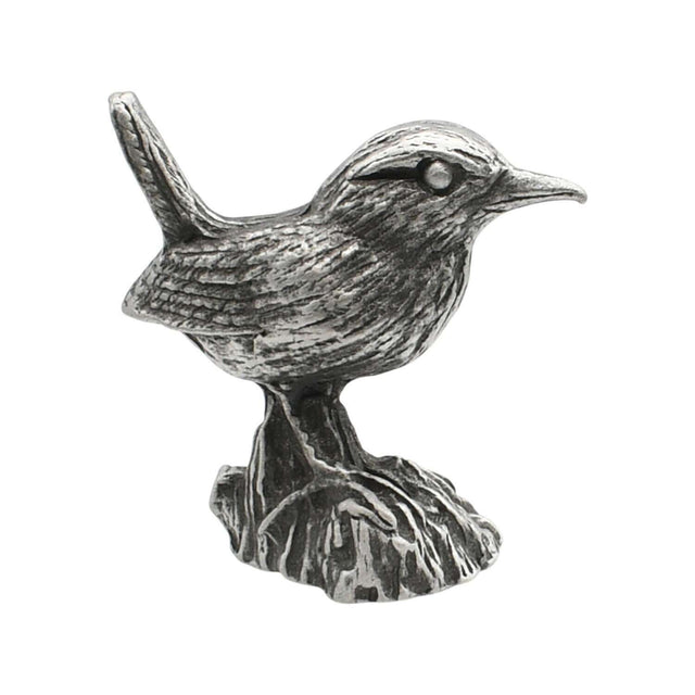 English-made pewter wren ornament perched on tree stump, first side showing raised tail and detailed wing feathers