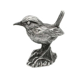 English-made pewter wren ornament, opposite side showing its raised tail, fine plumage and textured tree stump