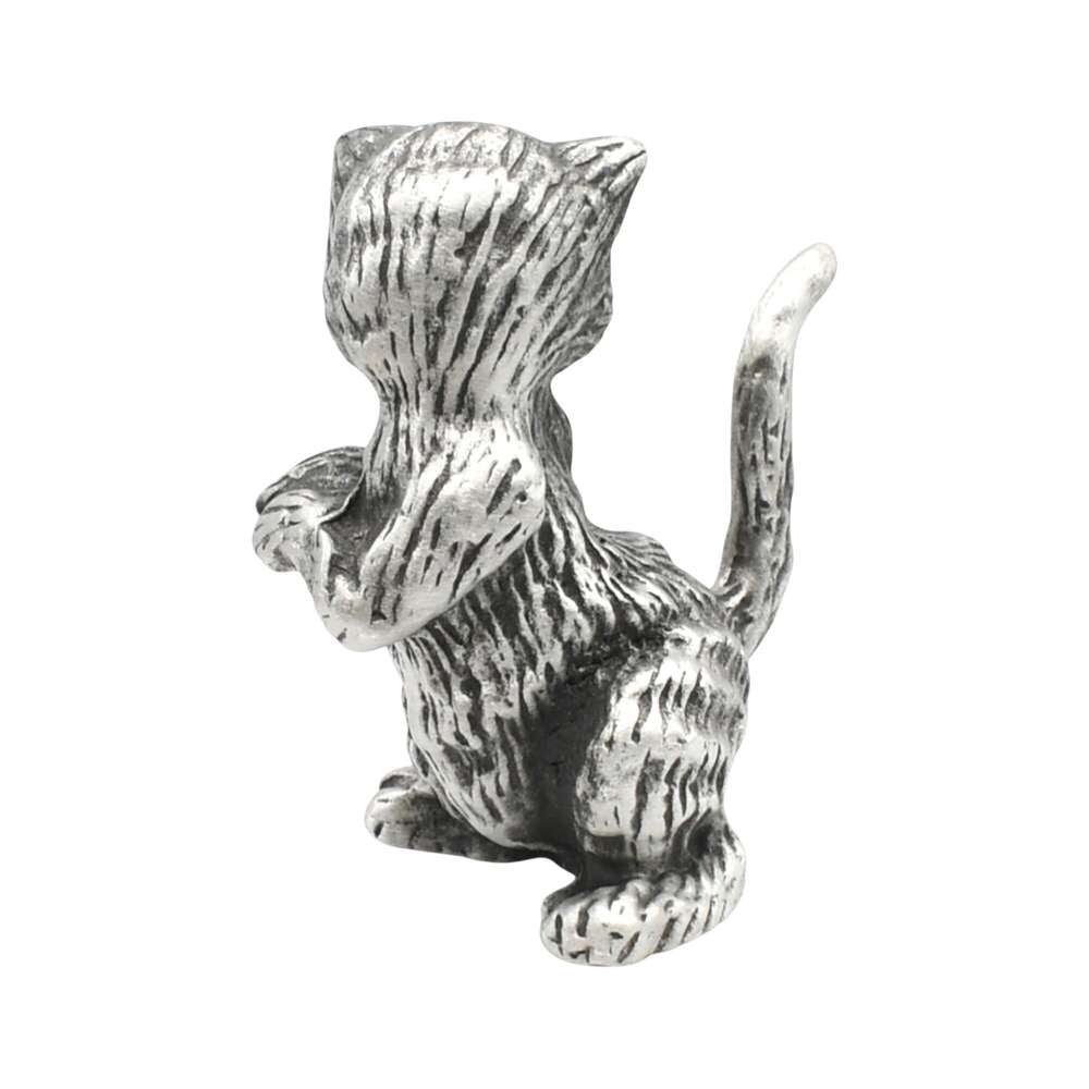 Back view of English-made pewter begging cat ornament showing textured fur and curved tail