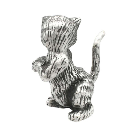 Back view of English-made pewter begging cat ornament showing textured fur and curved tail