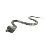 English made pewter long snake ornament with winding body and intricate scale pattern, top view
