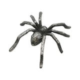 Reverse side of English-made pewter spider ornament with sculpted body and long legs