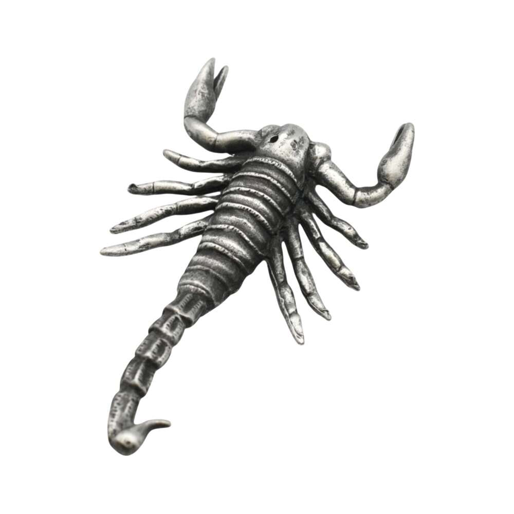 Reverse view of English made pewter scorpion figurine showing segmented body, pincers and tail