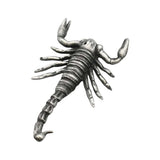 Reverse view of English made pewter scorpion figurine showing segmented body, pincers and tail