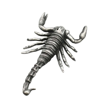 Reverse view of English made pewter scorpion figurine showing segmented body, pincers and tail