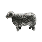 Opposite side view of English-made pewter ram figurine ornament showing textured wool and curved horns