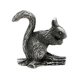 Opposite side of English-made pewter squirrel ornament with textured fur and curved tail on branch