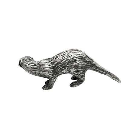Opposite side of English-made pewter otter ornament with sculpted fur and long tapering tail