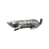 Side view of English-made pewter mole figurine showing its elongated body, digging paws and short tail