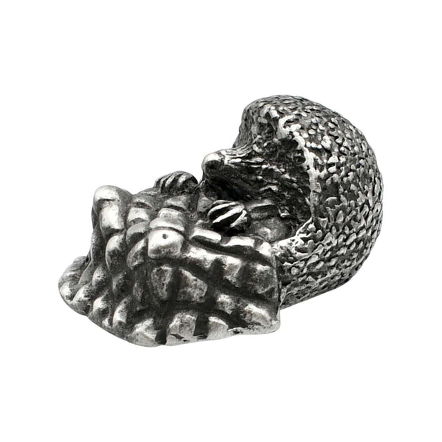 English-made pewter hedgehog with blanket ornament, curled hedgehog with textured spines and folded blanket, first angle