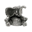 English-made pewter baby elephant figurine with raised trunk, large ears and feet out in front, front view