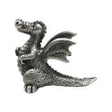 English made pewter sitting dragon figurine ornament – textured wings and long tail front view XCSORN067