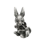 English made pewter rabbit with flowers figurine ornament, seated bunny holding a bouquet front view XCSORN082