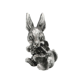 English made pewter rabbit with flowers figurine ornament, seated bunny holding a bouquet front view XCSORN082