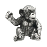 English made pewter seated chimpanzee figurine ornament with raised hand, front view XCSORN094